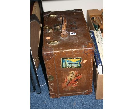 A HARRODS LTD. VINTAGE SUITCASE, painted brown canvas with tan leather mounts, various travel labels affixed, width 46cm x de