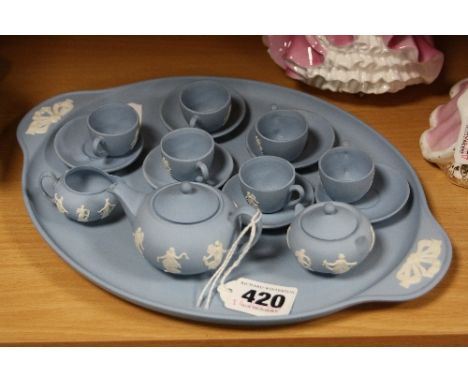A MINIATURE WEDGWOOD JASPERWARE TEASET AND TRAY, to include teapot, milk jug, covered sugar bowl and six cups and saucers