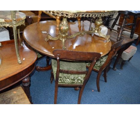 A VICTORIAN WALNUT BREAKFAST TABLE, on tripod base, approximate diameter 127cm and four chairs (5)