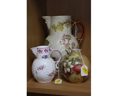 A ROYAL WORCESTER MASK JUG, late 19th Century, florally decorated, puce backstamp, height approximately 23cm (two chips to ba