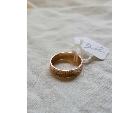 AN UNUSUAL ANTIQUE CHASED 9CT WEDDING RING  - similar to above lot - B'ham 1876