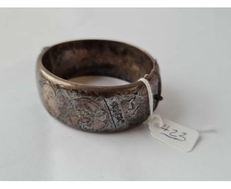A wide silver bangle - 38gms