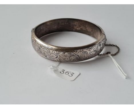 A Victorian engraved silver hinged bangle