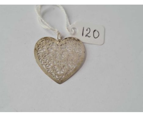 A silver fancy heart pendant
