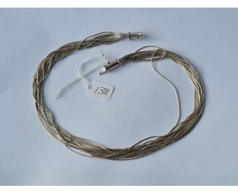 A multi strand silver necklace 40g
