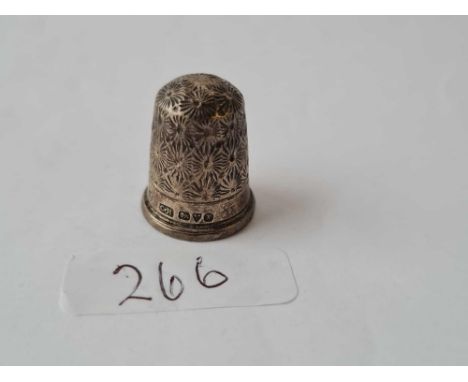 A silver thimble by Charles Horner