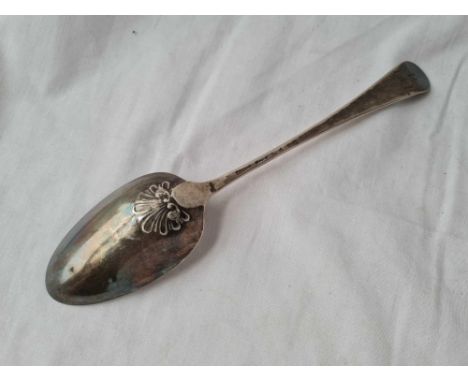 A Georgian bottom marked table spoon with shell decorated bowl by script JW 43 gms 