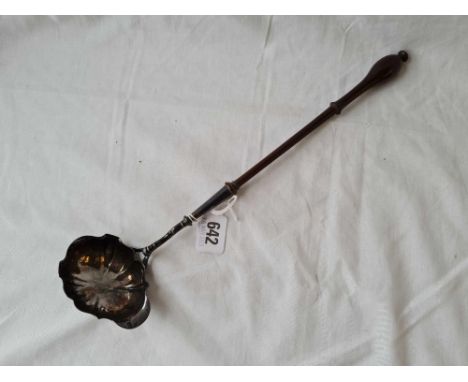 A good George II toddy ladle with shaped oval bowl and turned wood handle 13 inches long London 1746 by PG? 