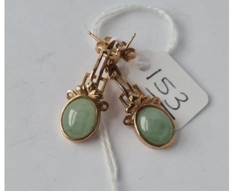 A pair of ornate jade earrings in 9ct - 4.7gms