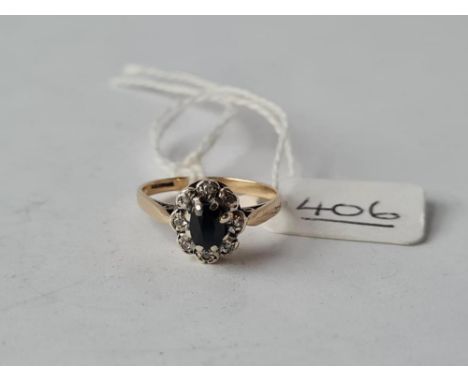 A sapphire &amp; diamond ring in 9ct - size L - 2.1gms