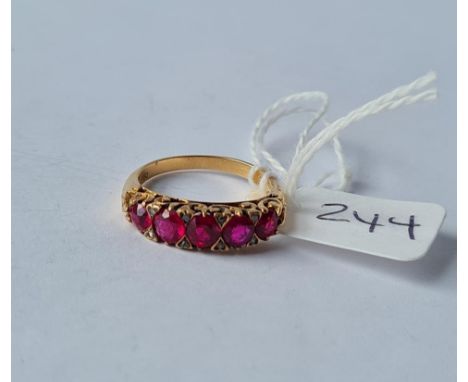 A RED STONE &amp; DIAMOND RING IN 18ct GOLD - size K - 4gms