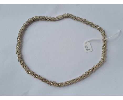 A fancy silver necklace - 20" long - 82gms