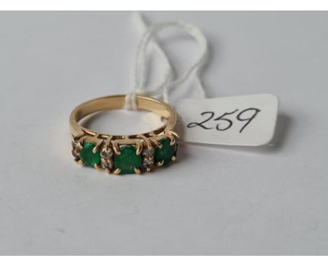 Emerald and small diamond ring 14k size L