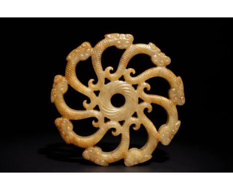 **NO RESERVE**A Chinese Yellow Jade Carved Circular Plaque with Dragon Motifs.A carved Chinese yellow jade plaque featuring a