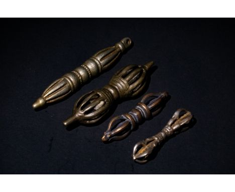 **NO RESERVE**A Lot of 4 Iron Vajras with Intricate Designs.This collection includes iron vajras of varying sizes, one featur