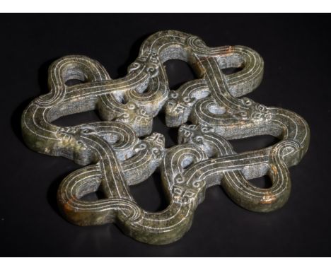 **NO RESERVE**A Chinese Carved Jade Plaque with Interwoven Dragon Motifs.This Chinese jade plaque showcases intricate carving