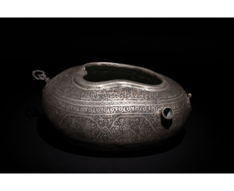 An Islamic Qajar Iron Kashkul Beggar's Bowl with Intricate Inlay and Figurative Motifs.This Qajar kashkul showcases intricate