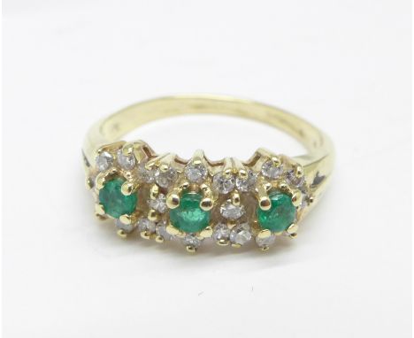 A 9ct gold, emerald and diamond triple cluster, hallmark worn, 2.2g, K 