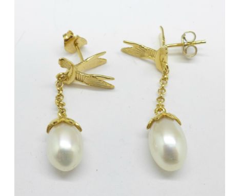A pair of silver gilt, freshwater pearl and bird pendant earrings 