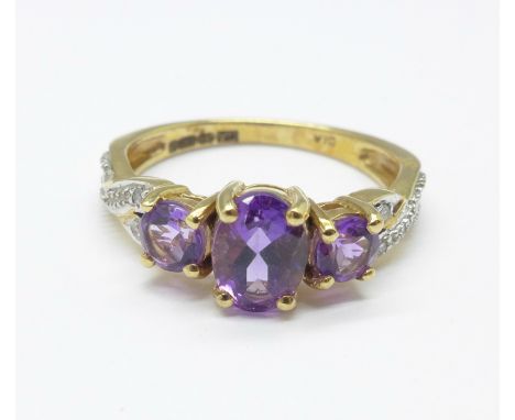 A 9ct gold, amethyst and diamond ring, 2.4g, M 