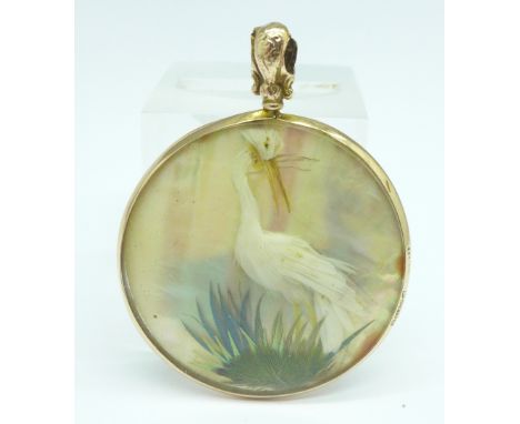 A 9ct gold and mother of pearl pendant, loop a/f, 39mm 