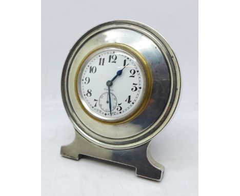 A silver framed 8-days clock, a/f 