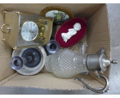 Assorted items including a pair of candlesticks, a Kundo anniversary clock, two Horlicks mixers, plated claret jug, etc. **PL