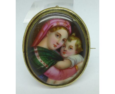 A hand painted portrait brooch 