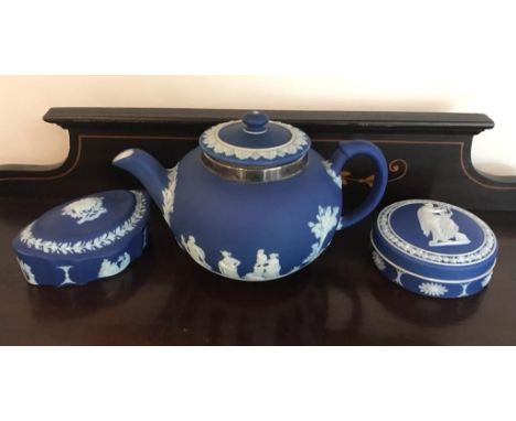 THREE PIECES OF WEDGWOOD, THE TEAPOT HAVING SILVER HALLMARKED BAND