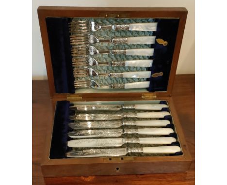 CASED SET OF TWELVE SILVER BANDED AND MOTHER OF PEARL HANDLED FISH KNIVES AND FORKS REASONABLE CONDITION, SLIGHT CHIPS