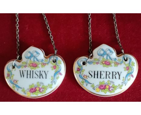 TWO CERAMIC ENAMELLED DRINK'S LABELS REASONABLE, USED CONDITION
