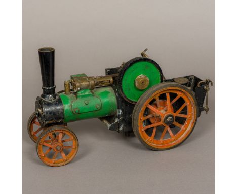 A vintage scale model of a steam plough engine
40 cm long.