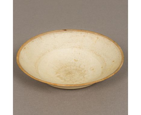 A Chinese Song Dynasty pottery bowlAnhua decorated.  17.5 cm diameter.Provenance: From the late Harry Lakin Collection of Lak