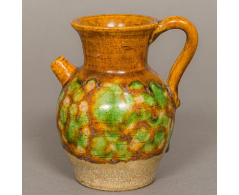 A Chinese Tang Dynasty pottery water dropperWith tortoiseshell glaze.  9.5 cm high.Provenance: From the late Harry Lakin Coll