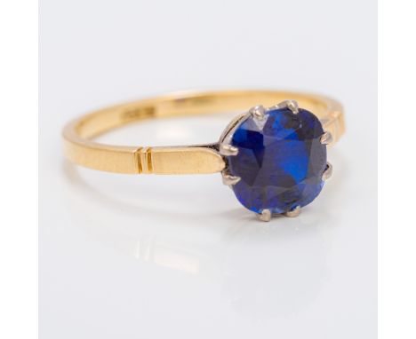 An antique 18 ct gold and sapphire solitaire ringThe claw set sapphire spreading to just under 2 carats. CONDITION REPORTS: S