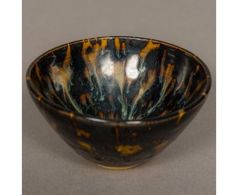 A Chinese Southern Song Dynasty pottery conical bowlWith all over tortoiseshell glaze.  11 cm diameter.Provenance: From the l