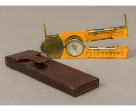 A Victorian brass mounted boxwood clinometer rule by Negretti & Zambra, LondonOf folding form, inset with a compass and twin 