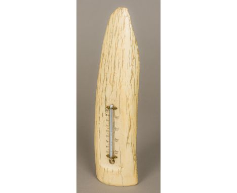 A 19th century desk thermometerMounted on a polished petrified tusk, possibly mammoth.  31 cm high.  CONDITION REPORTS: Therm