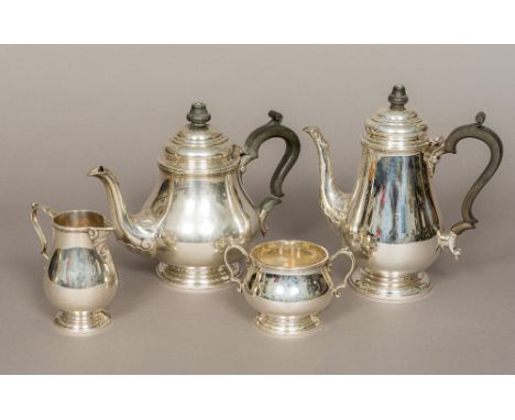 A four piece silver tea and coffee set, each hallmarked for Sheffield 1963, maker's mark of CB &amp; S
Comprising: teapot, co