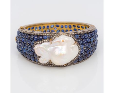 A Faberge type gold, diamond, sapphire and baroque pearl set hinged bangle, with 56 Zolotniki mark and maker's mark for CBThe