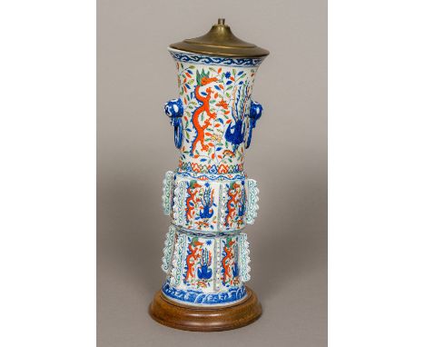 A Chinese porcelain lamp baseModelled as an archaistic twin handled vase with flanges.  43 cm high. CONDITION REPORTS: Genera