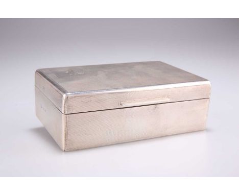 AN ELIZABETH II SILVER CIGARETTE BOX, by Mappin &amp; Webb Ltd, London 1959, rectangular, with an engine-turned ground, crest