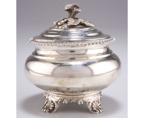 A WILLIAM IV SILVER CADDY, by Richard Pearce &amp; George Burrows, London 1837, squat circular form, the hinged cover with fo