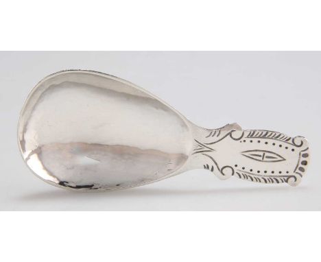 A GEORGE V SILVER CADDY SPOON, by Liberty &amp; Co Ltd, Birmingham 1934, no. 3181, plain pear-shaped bowl, the handle also wi