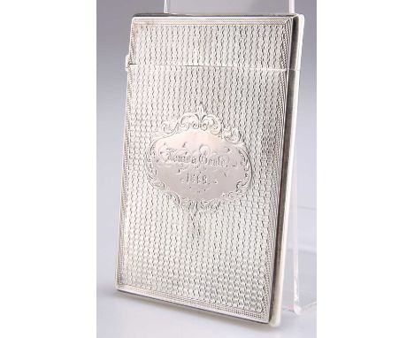 A VICTORIAN SILVER CARD CASE, by Robert Thornton, Birmingham 1868, rectangular with hinged cover and engine-turned ground, en