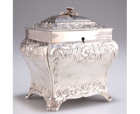A VICTORIAN SCOTTISH SILVER TEA CADDY, marks rubbed, of bombe form, boldly chased with flowers and scrolls, raised on scroll 