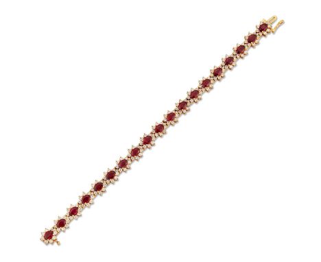 A RUBY AND DIAMOND CLUSTER BRACELET, oval-cut rubies within borders of round brilliant-cut diamonds. Estimated total diamond 