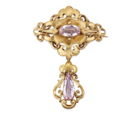 AN EARLY 19TH CENTURY PINK TOPAZ BROOCH, an oval-cut pink topaz within a fancy quatrefoil frame, suspending a pink topaz pend