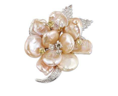 A CULTURED PEARL AND DIAMOND EN TREMBLANT BROOCH, designed as a flower head with pink cultured pearl petals and an en trembla