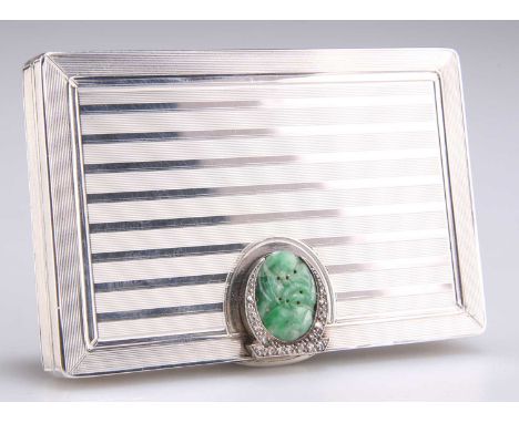 AN ART DECO FRENCH SILVER, JADE AND DIAMOND CASE, by August Peuzoulle, rectangular with reeded engine-turned bands, the inter